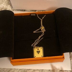 Hermes pendant, worn twice